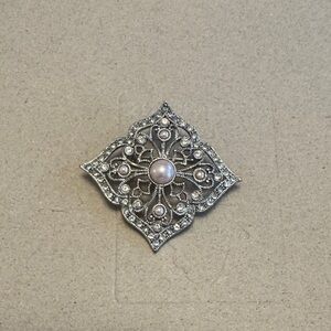 Elegant Silver and Pearl Brooch